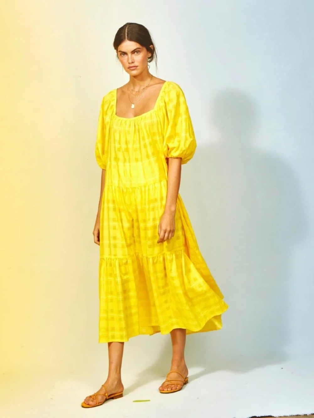 Bright, bold, and effortlessly chic — this Solid & Striped yellow midi dress is